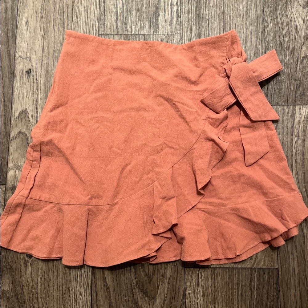 Beautiful mini skirt size small, new without tag, never used pink/orange